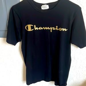 Black champion T-shirt gold logo